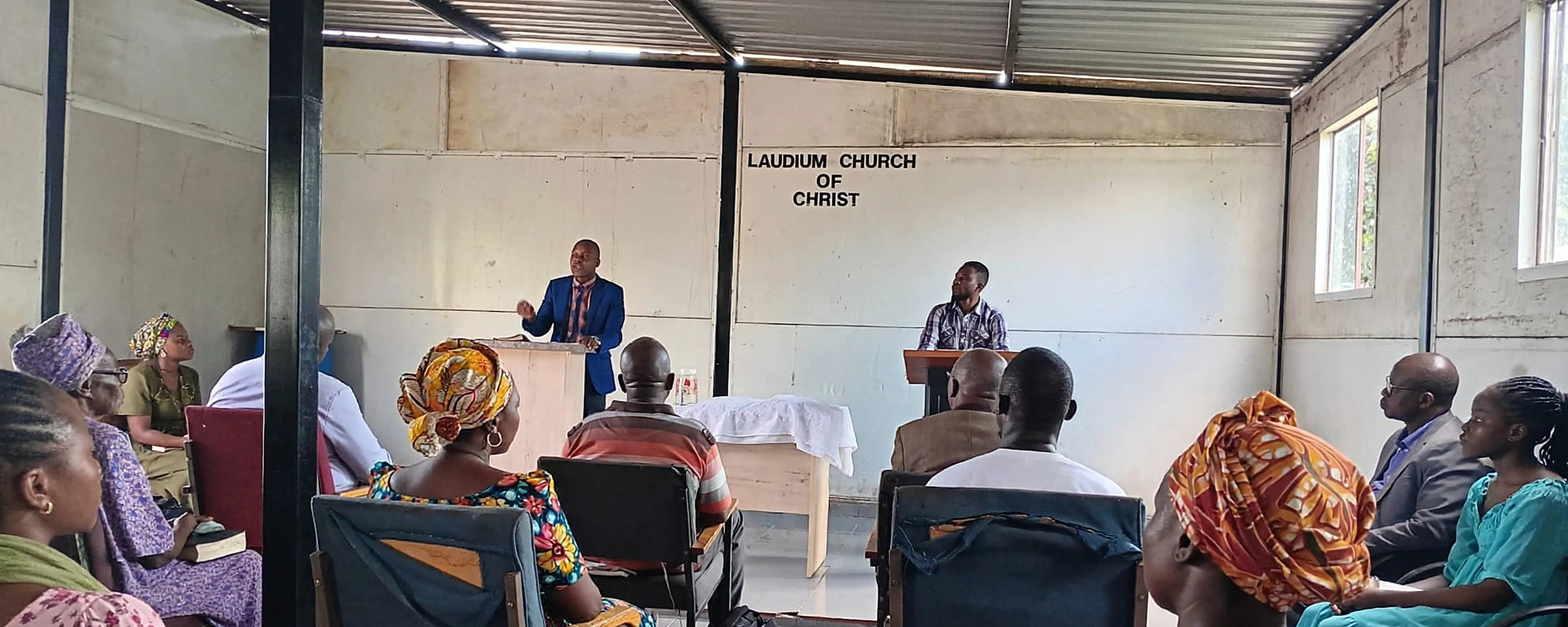 Members of Laudium Church of Christ listen to a Bible lesson in their meeting hall in Pretoria
